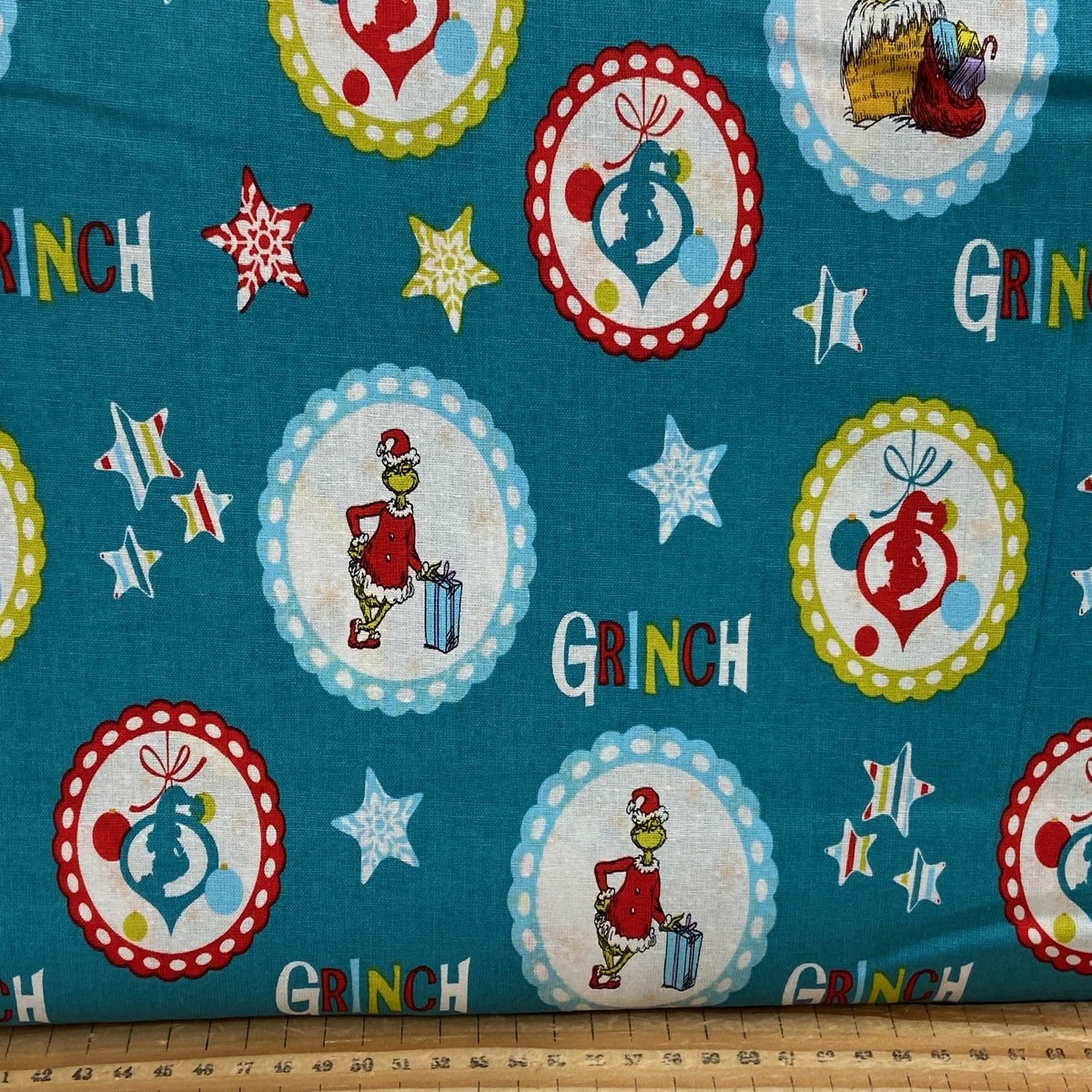 Dr Seuss The Grinch Christmas Stars & Badges Teal Cotton Fabric by 1/4 Metre*